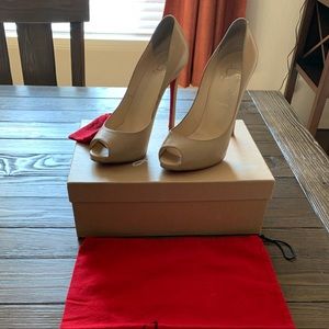 Lightly used red bottoms.